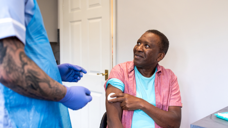 Man receiving vaccination © iStockphoto